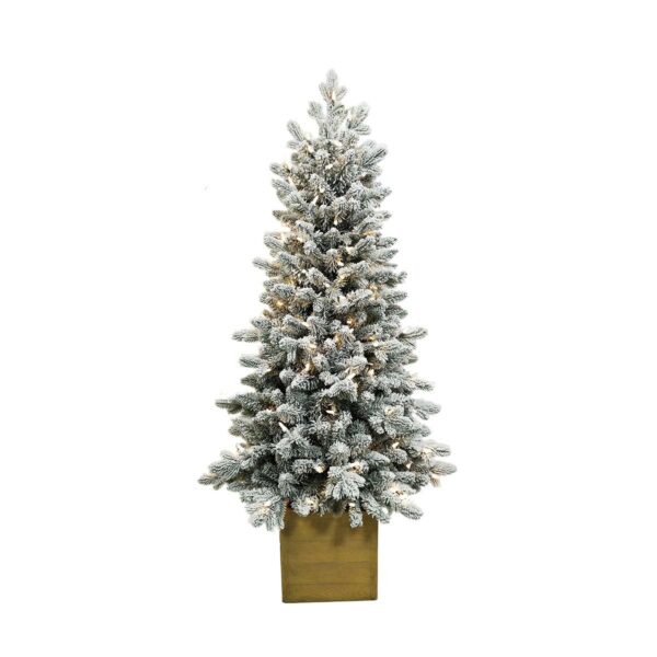 Petit sapin lumineux enneigé