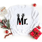 Pull Mr. et Mrs. avec motif renne