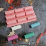 petit moule à bûche plastique rose