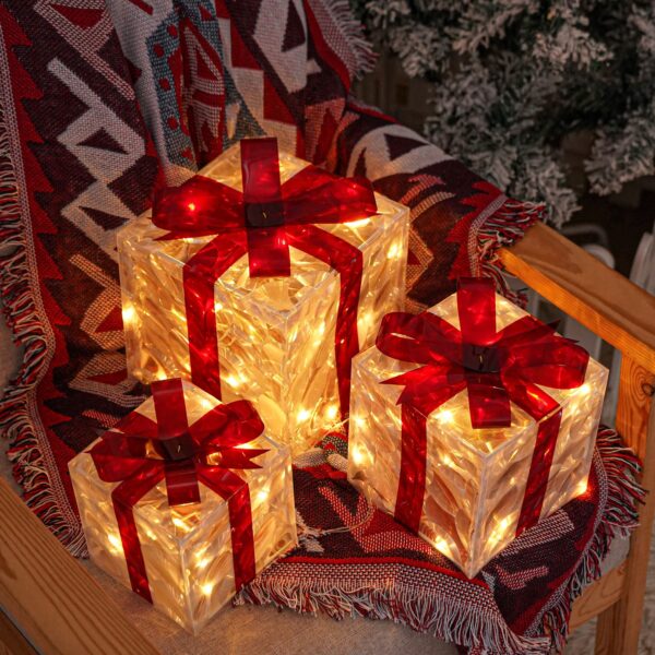 boîtes cadeaux de Noël illuminées